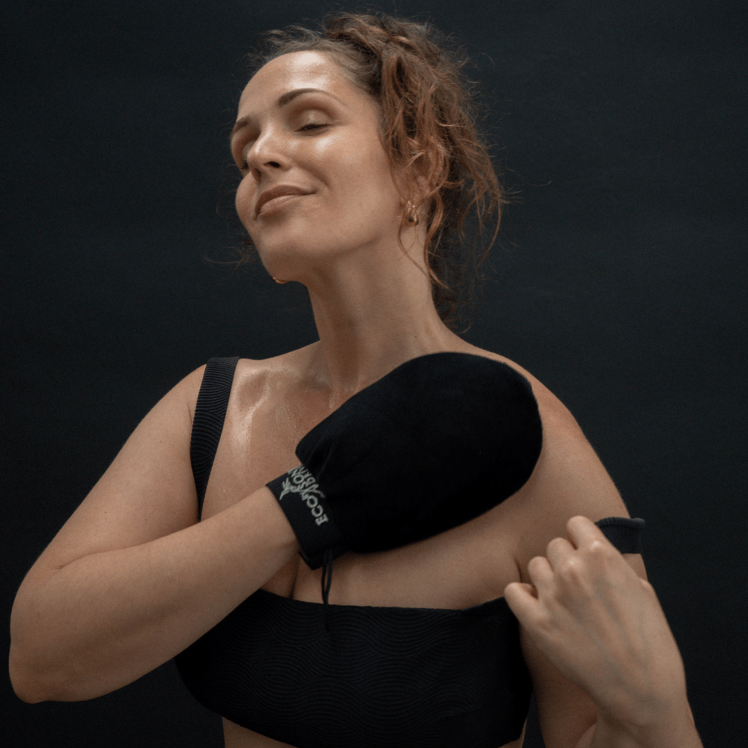 Eco by Sonya reusable double sided tanning mitt applying tan to skin